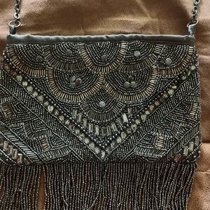 NWOT Chico’s beaded silver purse with fringe and chain strap